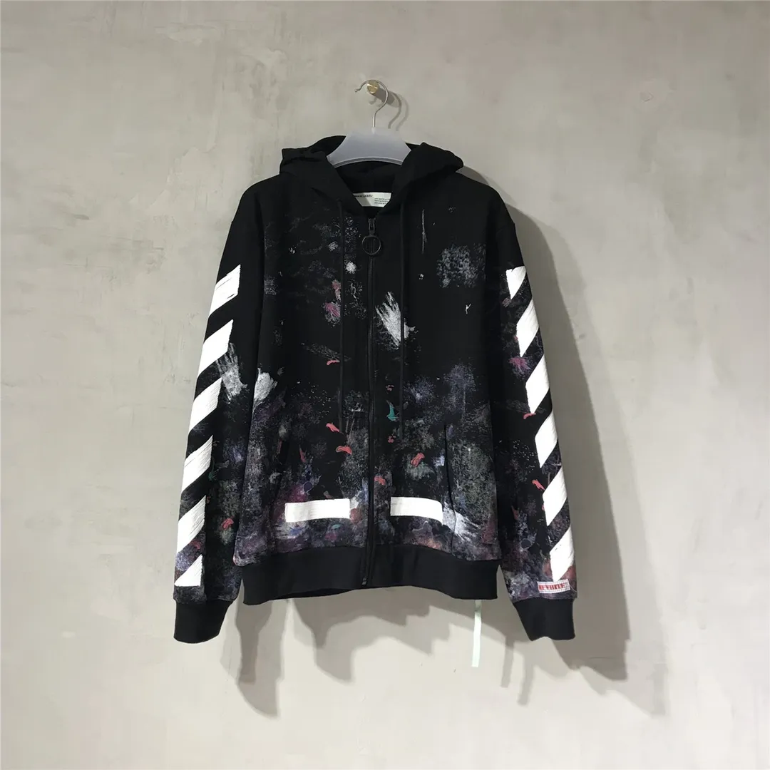 The top tested version for spring and autumn OFFWHITE Starry Sky Fireworks Melbourne Limited Ink Splash Hoodie Hooded Zip Jacket Sweatshirt Fabric: Made of custom-made (more than 490 grams - double-ply large terry fabric at the counter) high-weight fabric made into clothes that look more textured, soft to the touch, super thick, classic version, small dropped shoulders, micro silhouette! Pay attention to the important points~ The weight of more than 490 grams is not exaggerated and does not contain water. Those sellers who brag about the weight can only deceive novice customers. But when you get our goods, the weight and sinking are right there. You can taste it yourself, and the texture does not lie! (100% cotton fabric, no pilling) The white arrows on the back + the stripes on the arms are all made of foam and have a feel and protrusions. The fireworks color system is obtained through contrasting printing. There are eight panels in the whole body. Seven color sets and eight panels are printed in eight times. The first layer is gray, the second layer is white, the third layer is yellow, the fourth layer is green, the fifth layer is blue, the sixth layer is purple, the seventh layer is orange. The last layer is arrow paint printing. The seven colors are layered on each other, which will also create new colors. The arrows on the back and the front squares are first glued and then hung in four layers. The paint has an obvious concave and convex feeling. Quality speaks for itself in the details. The blue letters are electrostatic three-dimensional flocking, which is done separately and then printed through high-temperature thermal transfer‼ ️It can be called a fake killer, you can see that every detail on the clothes is ceiling craftsmanship‼ ️ Size chart